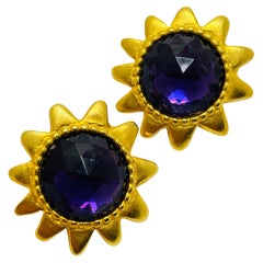 Vintage gold tone amethyst glass designer clip on earrings