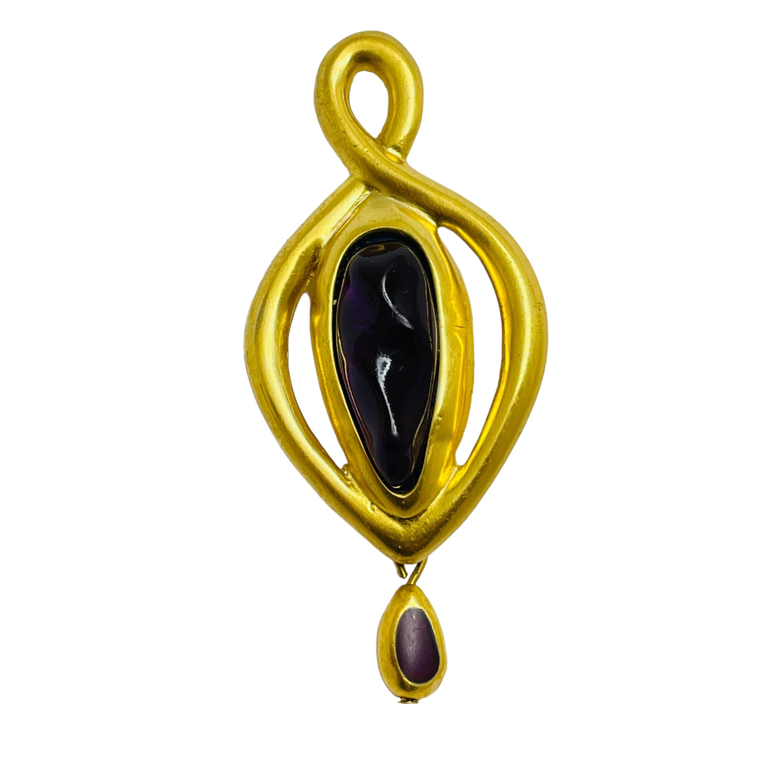 DETAILS

• unsigned

• gold tone with poured glass

• vintage designer brooch

MEASUREMENTS  

• 2 3/4