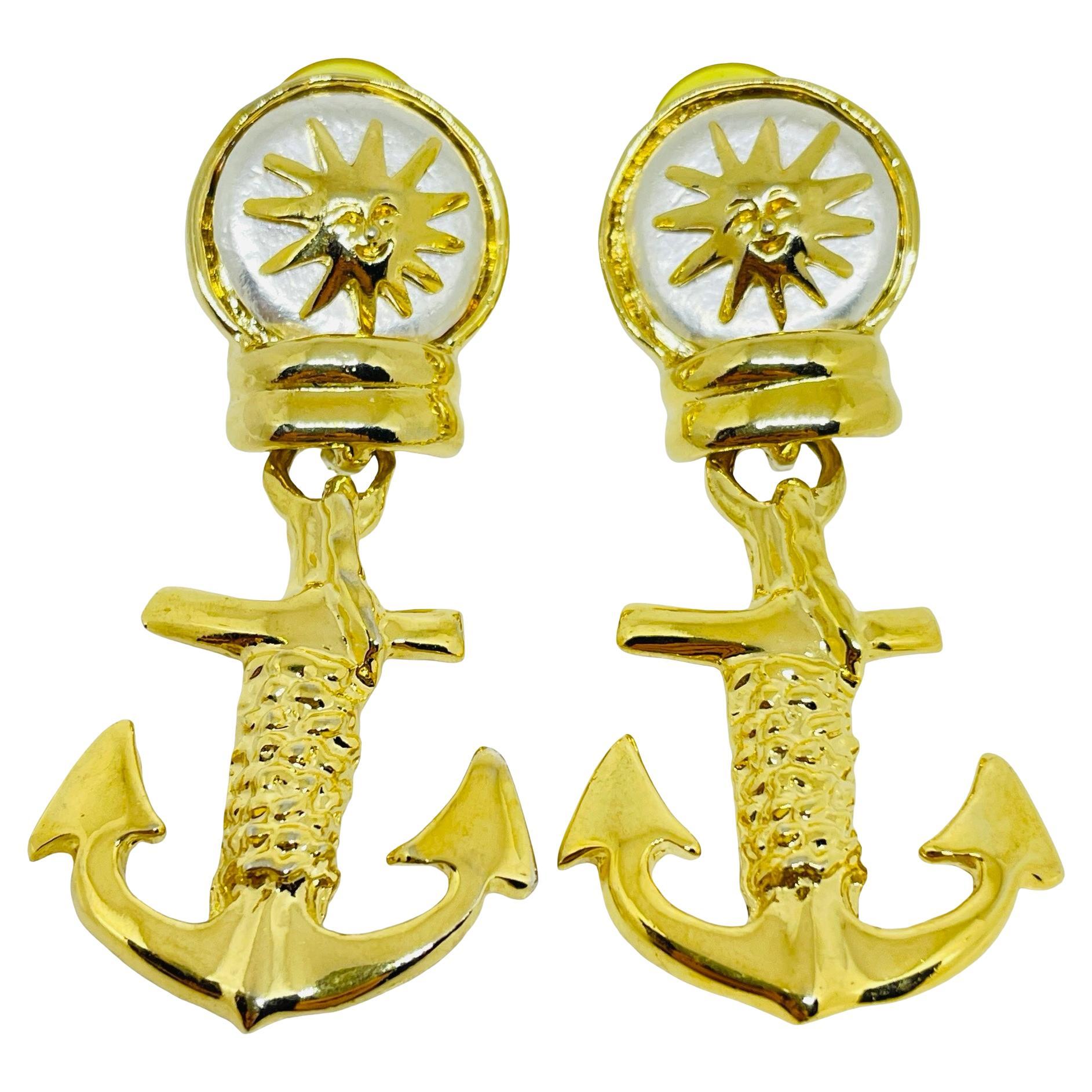 Vintage gold tone anchor sun face designer pierced earrings
