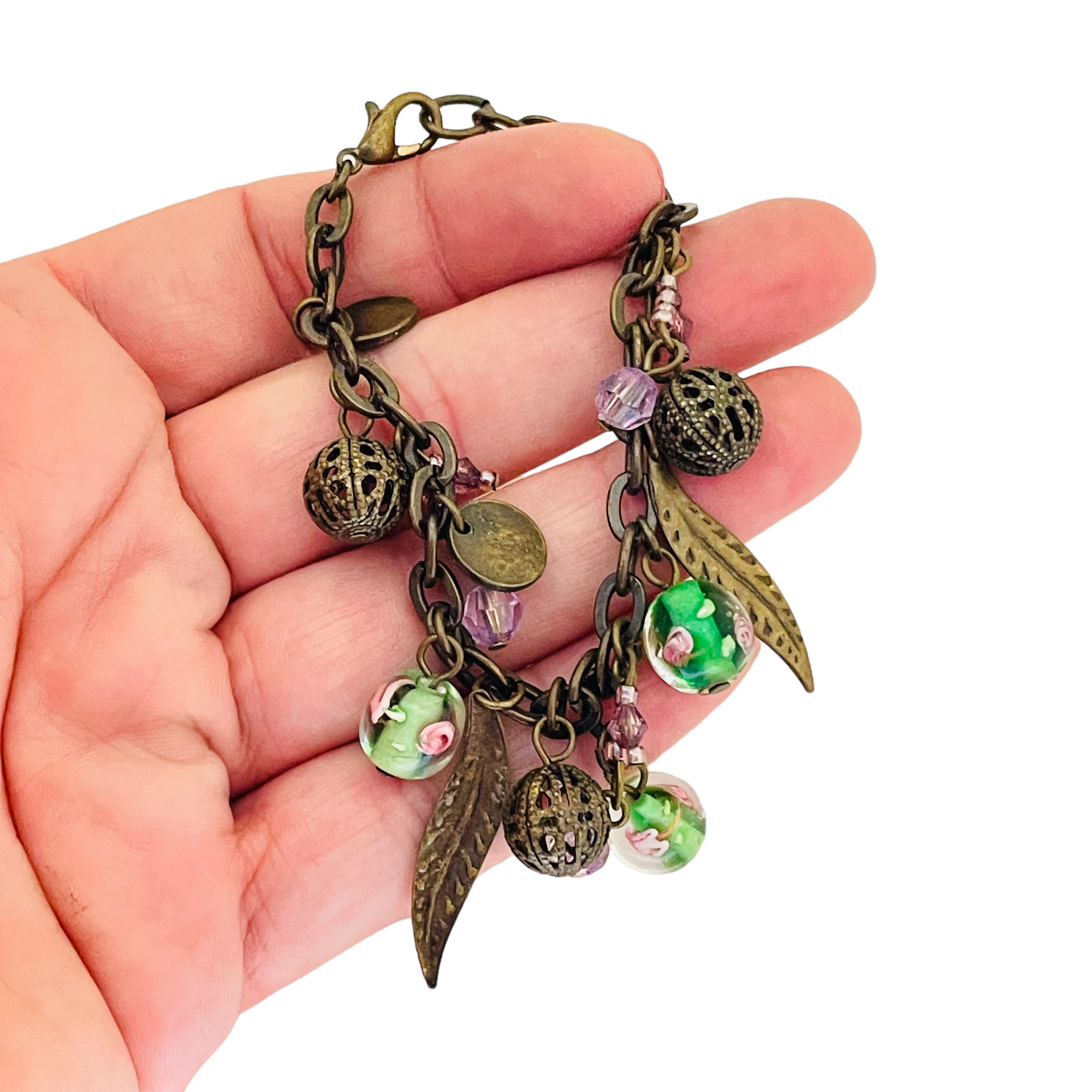 DETTAGLI

- senza segno

- tono oro con perline di vetro

- bracciale vintage di design  

MISURE  

- 

CONDIZIONE

-  ottime condizioni vintage con minimi segni di usura 

 Sku 33

❤️❤️   GIOIELLI DI DESIGN VINTAGE   ❤️❤️

❤️❤️  ALEXANDER'S