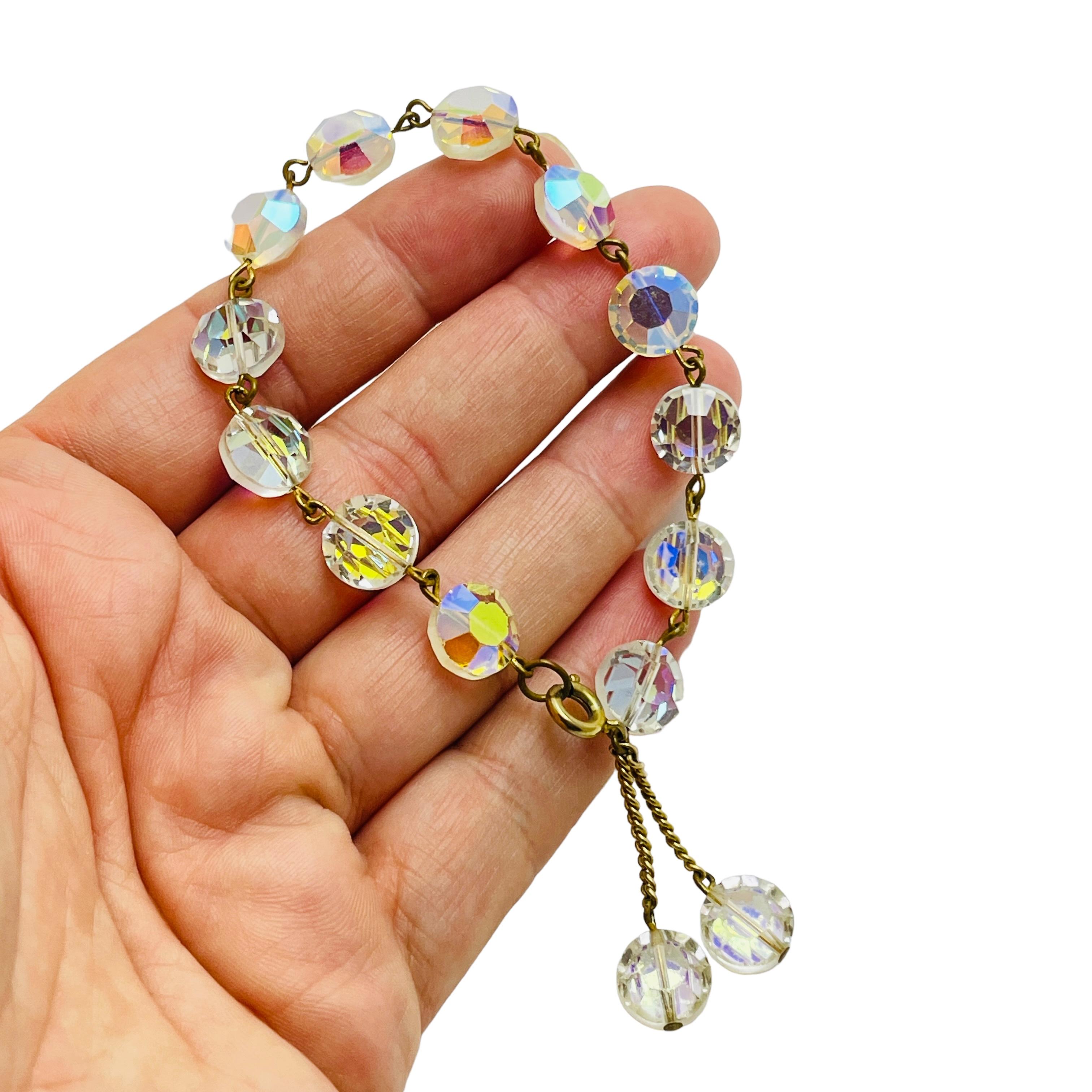 DETAILS

• unsigned 

• gold tone with crystal beads  

• vintage designer bracelet 

MEASUREMENTS  

• 7.5