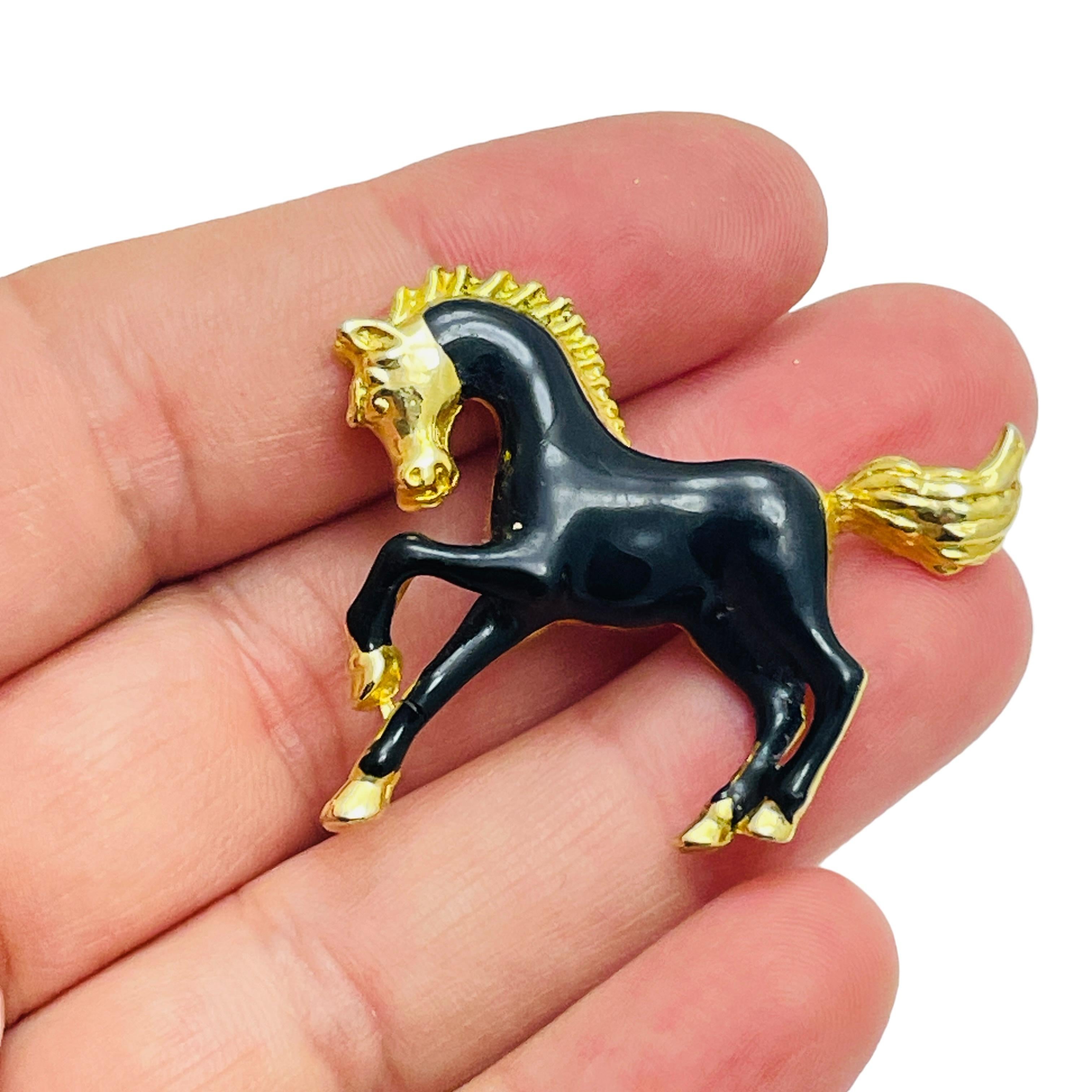 Women's Vintage gold tone black enamel horse figural designer brooch For Sale