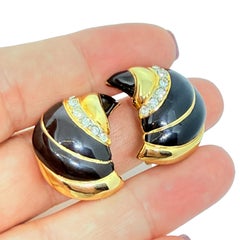 Vintage gold tone black enamel rhinestones designer clip on earrings