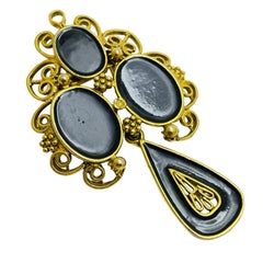 Vintage gold tone black glass dangle designer brooch