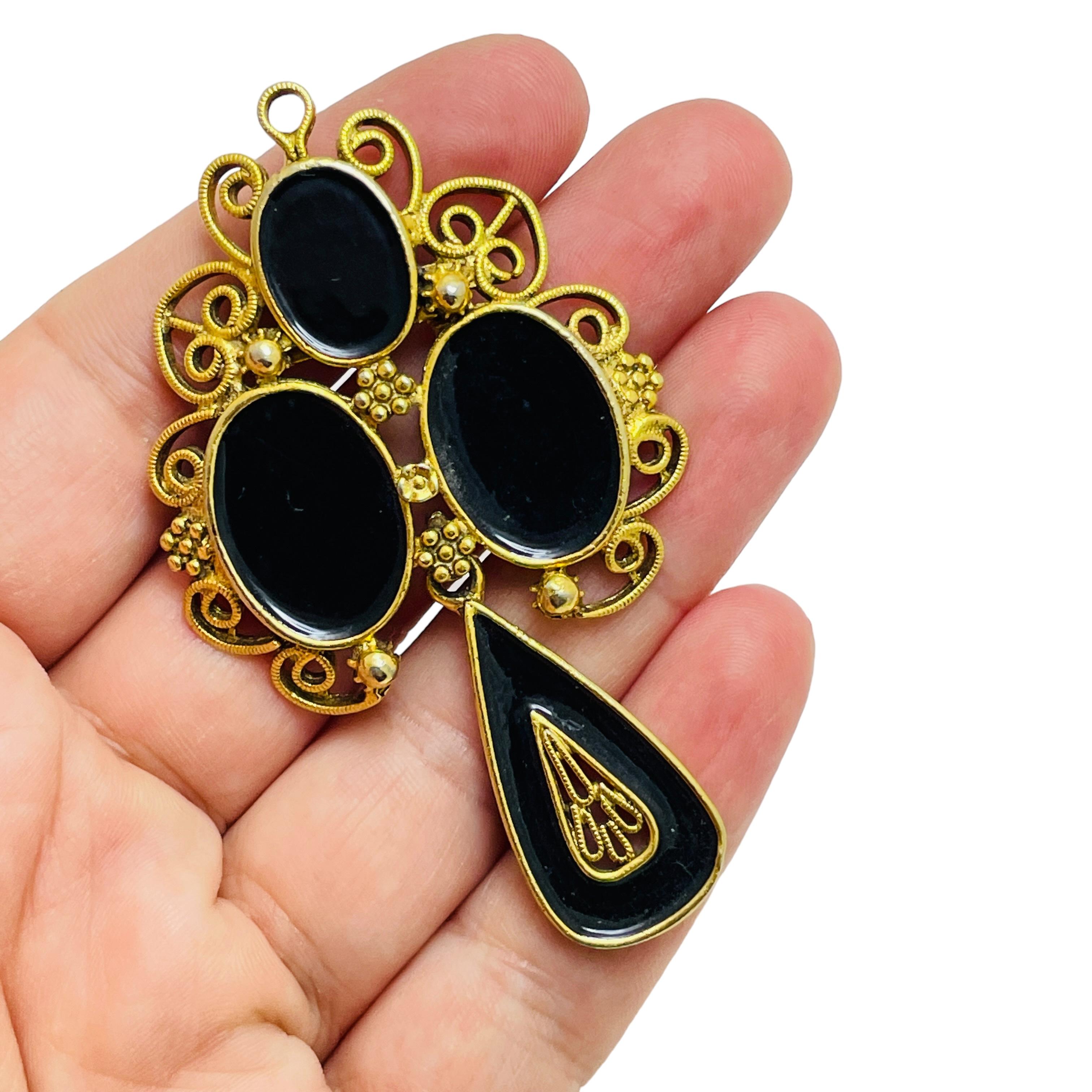Women's Vintage gold tone black glass dangle designer brooch For Sale