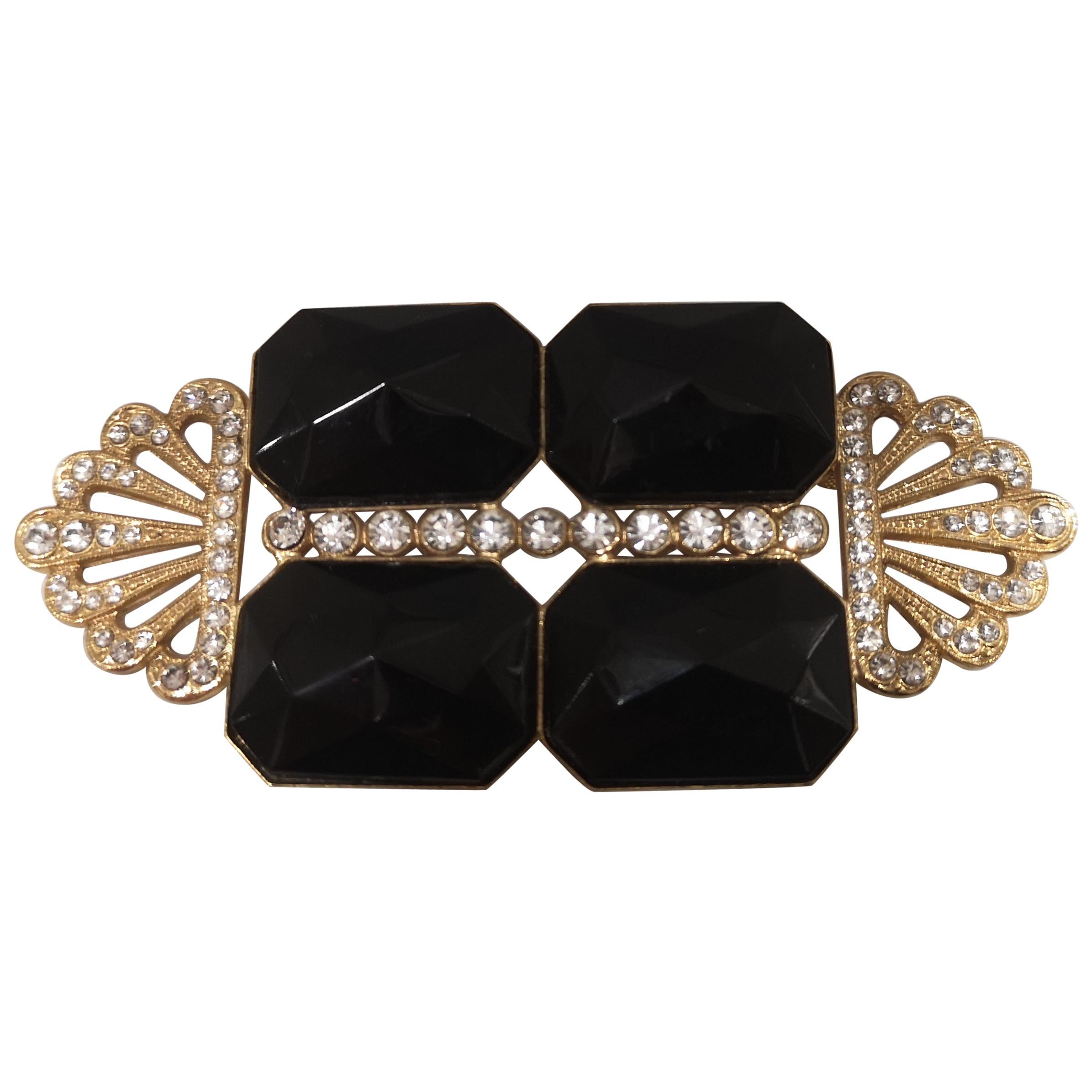 Vintage gold tone black stones brooch For Sale