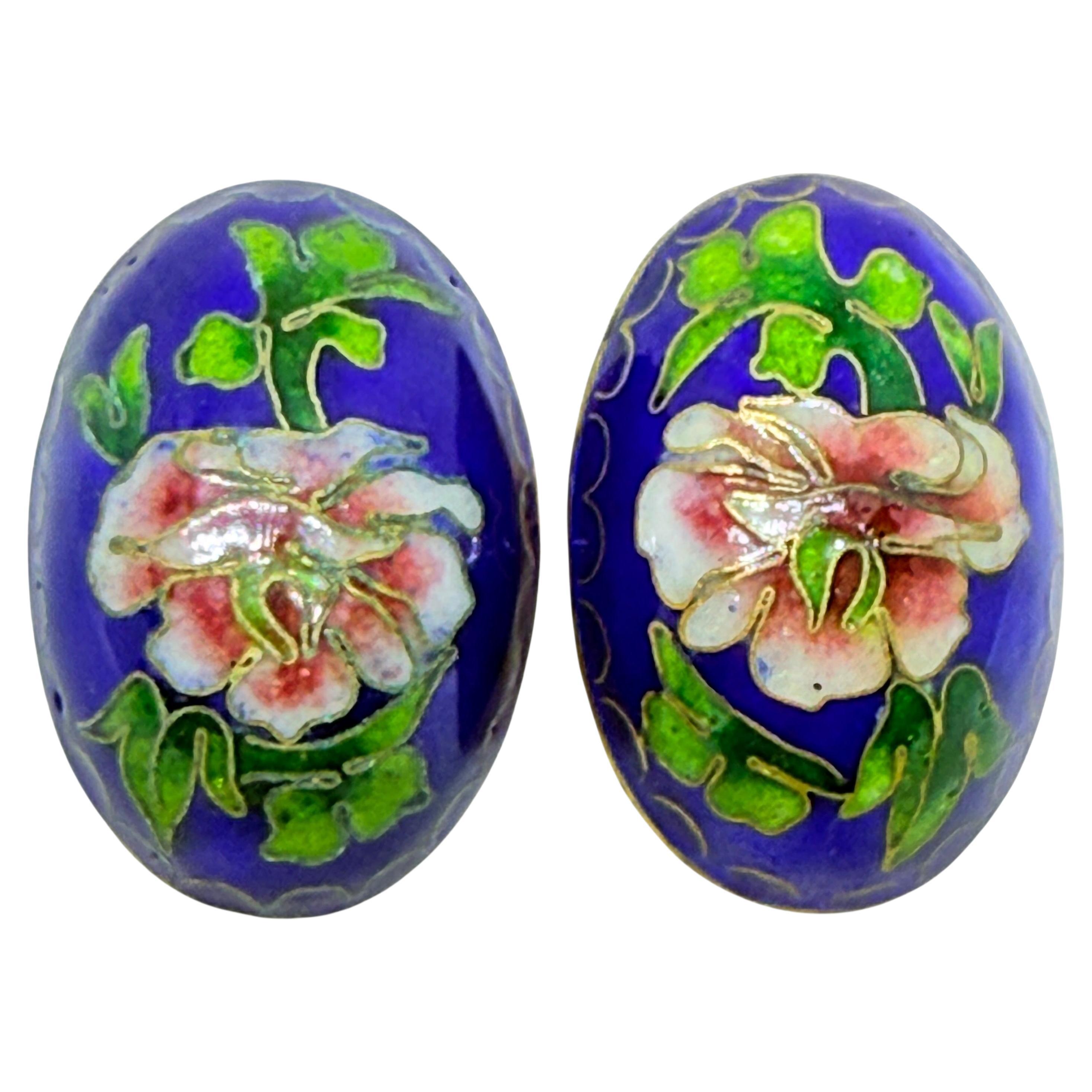 Orecchini a clip d
epoca con fiore smaltato blu e tono oro