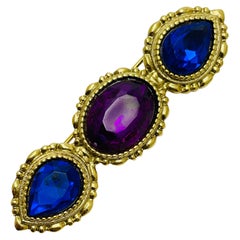 Broche de diseño vintage de cristal azul púrpura en tono dorado