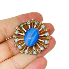 Vintage gold tone blue rhinestones glass cabochon designer brooch