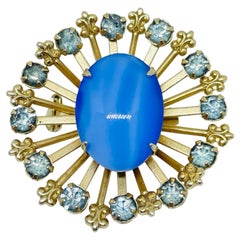 Vintage gold tone blue rhinestones glass cabochon designer brooch
