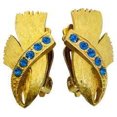 Boucles d'oreilles à clip de créateur vintage, couleur or, ornées de strass bleu saphir