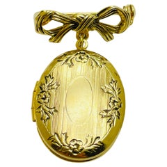 Vintage gold tone bow dangle locket designer brooch