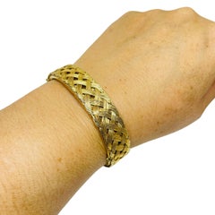 Vintage goldfarbener geflochtener Designer-Armreif mit Kette