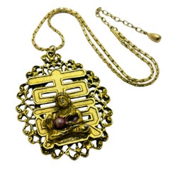 Vintage gold tone Buddha pendant necklace