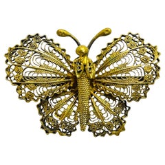 Vintage gold tone butterfly designer brooch