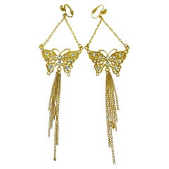 Pendientes de clip vintage con cadena colgante, borla y forma de mariposa con strass en tono dorado