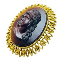 Vintage gold tone cameo designer brooch