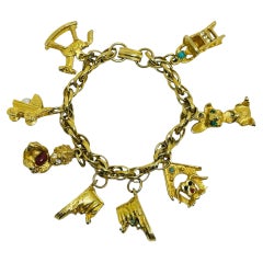 Vintage gold tone chain baby dog shoe charms designer bracelet