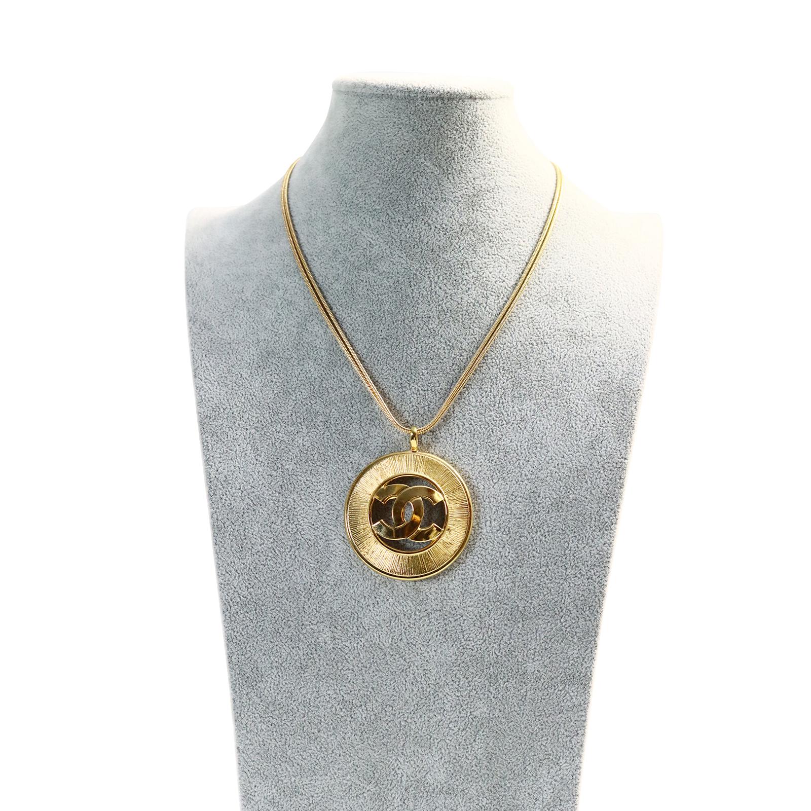 Women's or Men's Vintage Gold Tone Chanel Dangling Disc with Double CC Circa 1980s