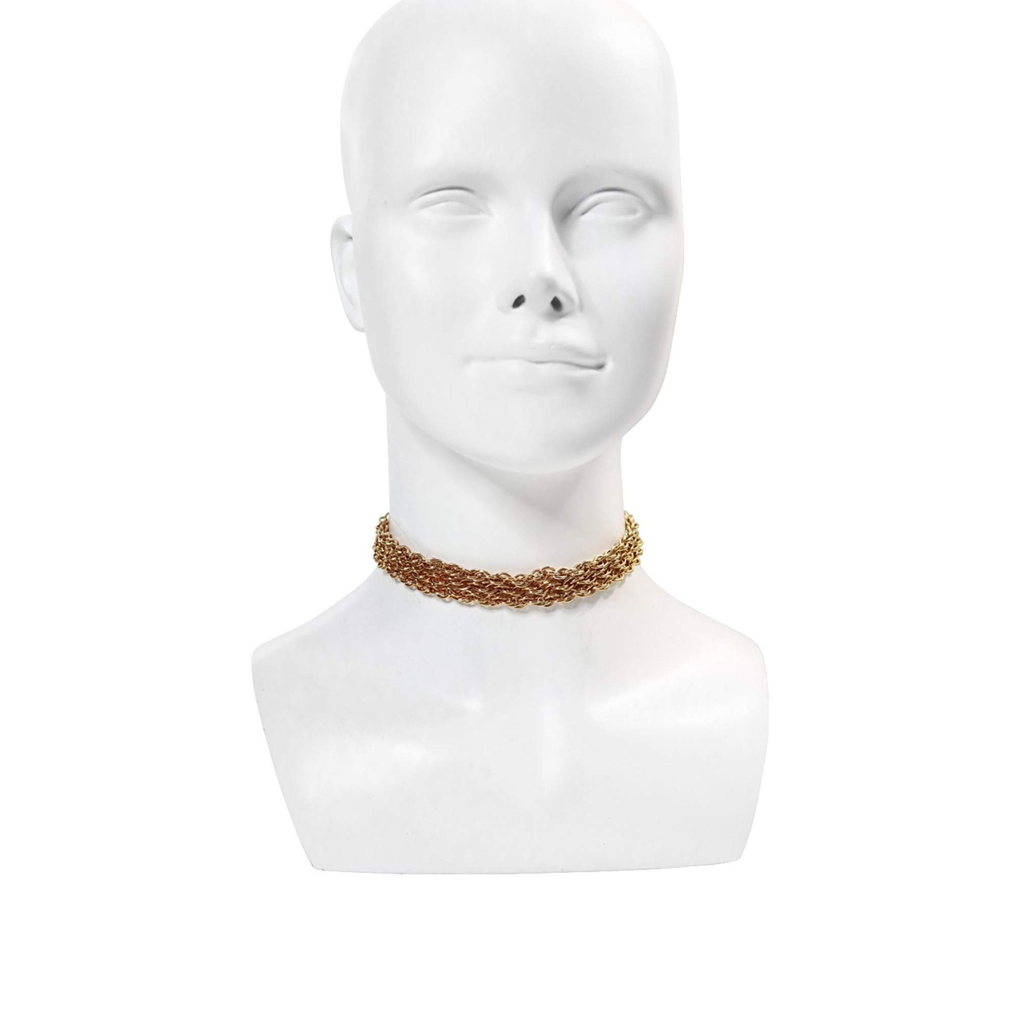 Vintage Gold Tone Choker, Circa 1990s. This simple piece adds the finishing touch that elevates your outfit to the next level. It is very minimalistic, but don't let that fool you. This small piece of metal, arranged in three rows, will elevate you