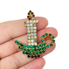 Vintage gold tone Christmas candle rhinestone designer brooch