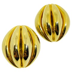 Vintage gold tone chunky designer clip earrings