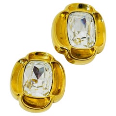 Orecchini a clip di design in vetro chiaro d
oro vintage