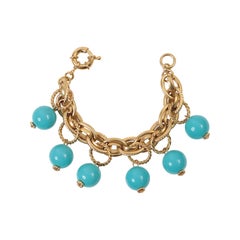 Vintage Gold Tone Dangling Faux Turquoise Bracelet Circa 1980s