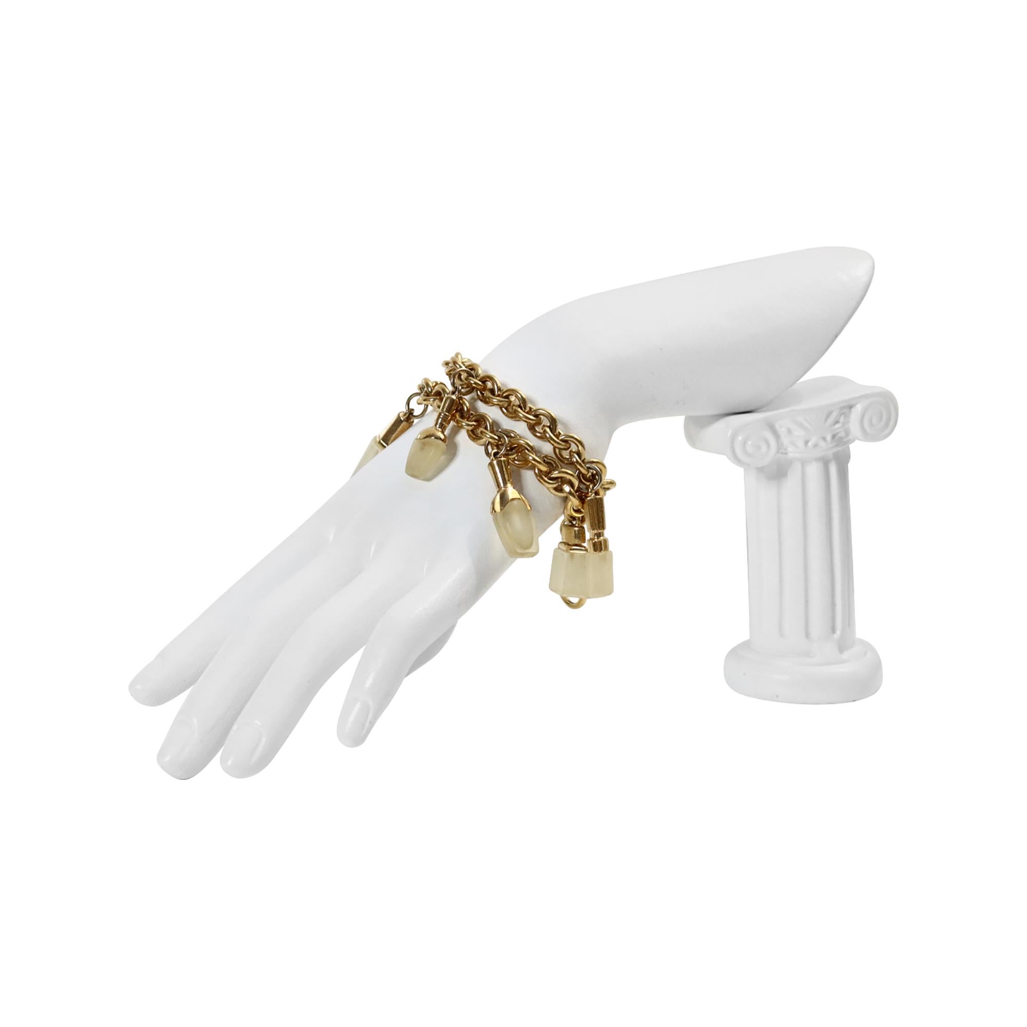 Goldfarbenes baumelndes Parfümflaschenarmband, circa 1980er Jahre im Zustand „Gut“ im Angebot in New York, NY