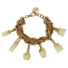 Retro Gold Tone Dangling Perfume Bottle Bracelet, circa 1980s