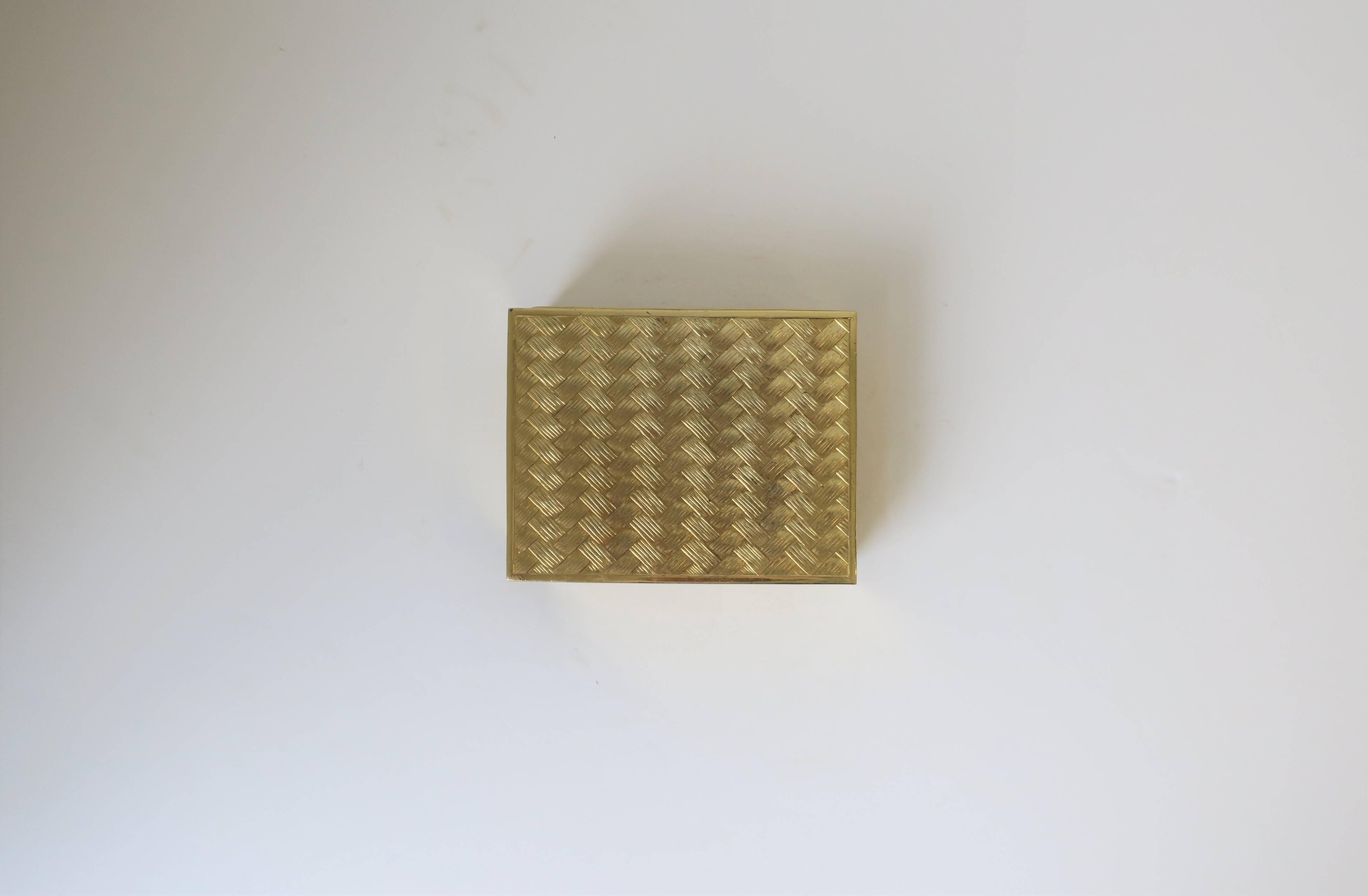 A chic vintage Italian shinny gold brass box with decorative Chevron or parquet designed top lid and wood lining, circa 1970s, Italy. Easy open/close. Convenient for jewelry or other small items on a desk, vanity, nightstand area, etc. Box may have