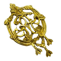 Vintage gold tone designer brooch