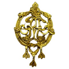 Vintage gold tone designer brooch