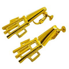 Vintage gold tone designer clip on earrings