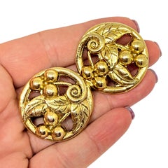 Vintage gold tone designer clip on earrings