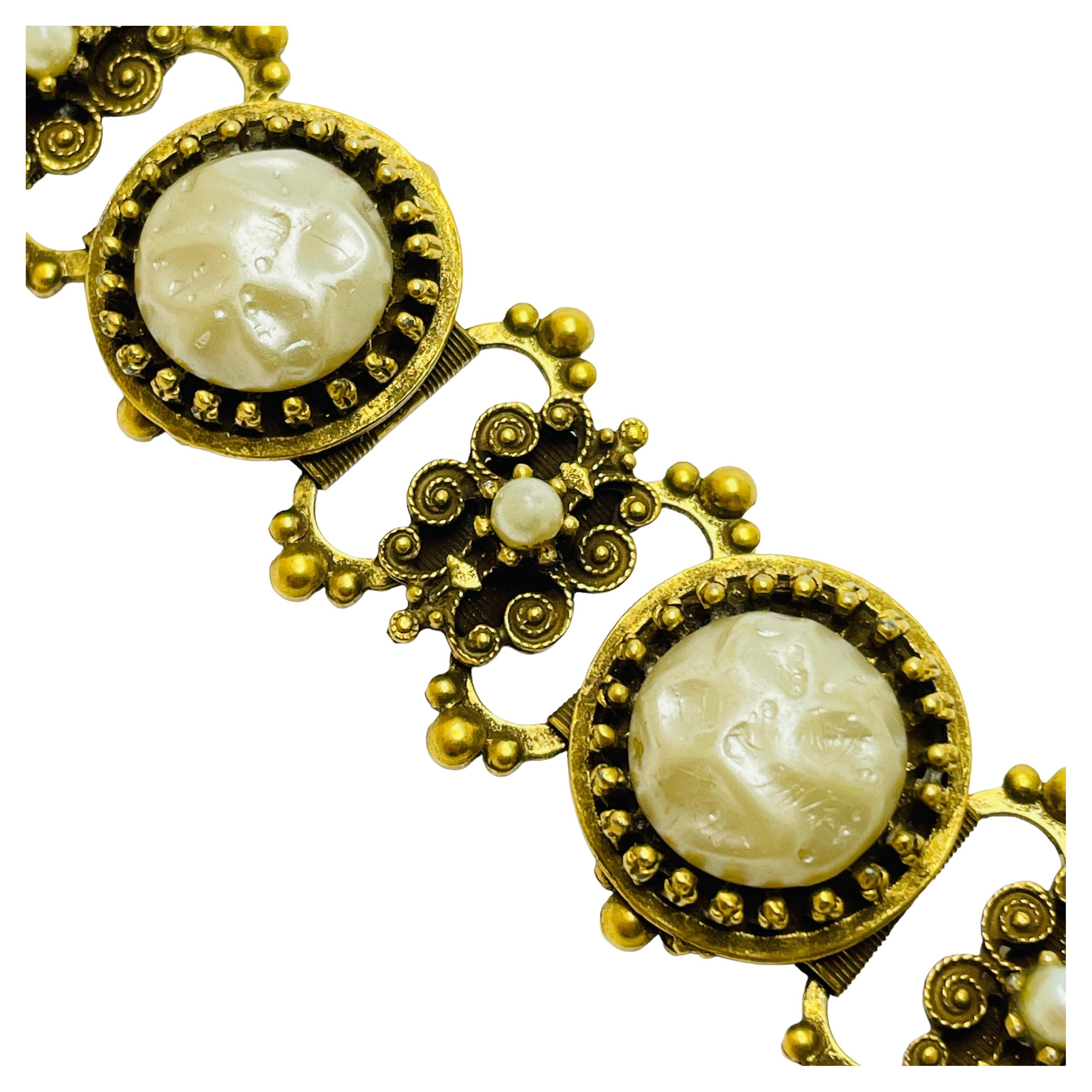 Vintage gold tone designer clip on earrings For Sale