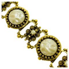 Vintage gold tone designer clip on earrings