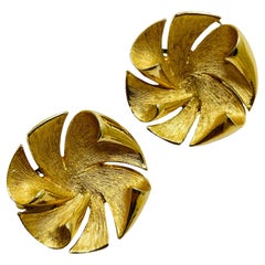 Vintage gold tone designer clip on earrings