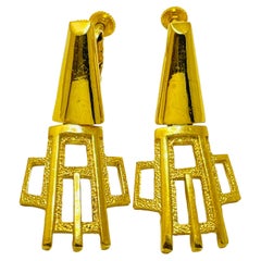 Vintage gold tone designer clip on earrings