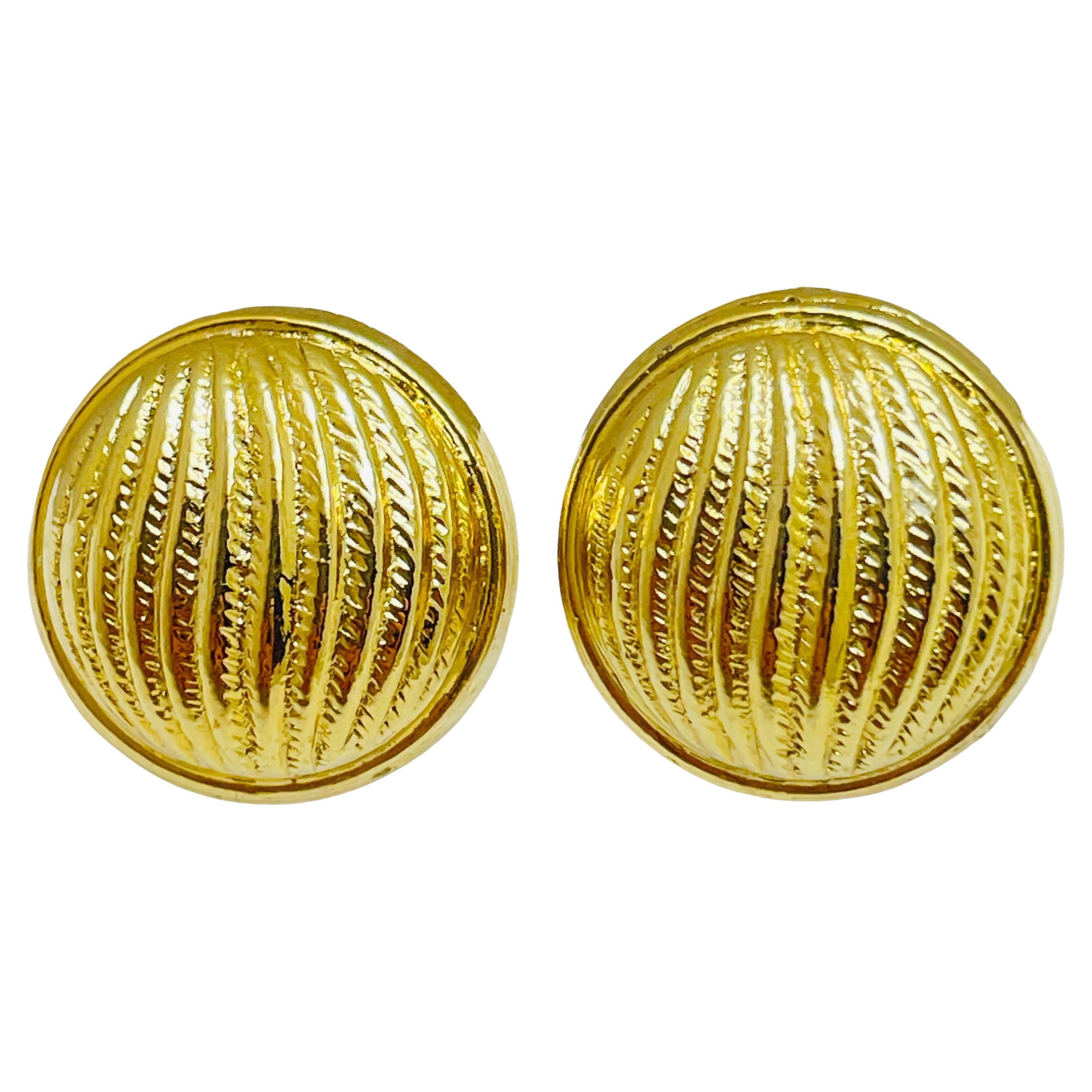 Vintage gold tone designer clip on earrings For Sale