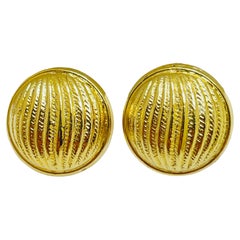 Vintage gold tone designer clip on earrings