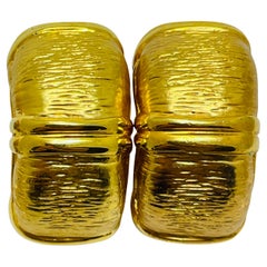 Vintage gold tone designer clip on earrings