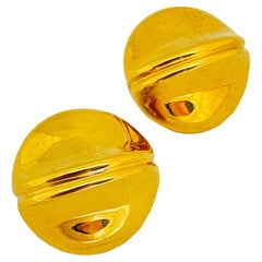 Vintage gold tone designer clip on earrings