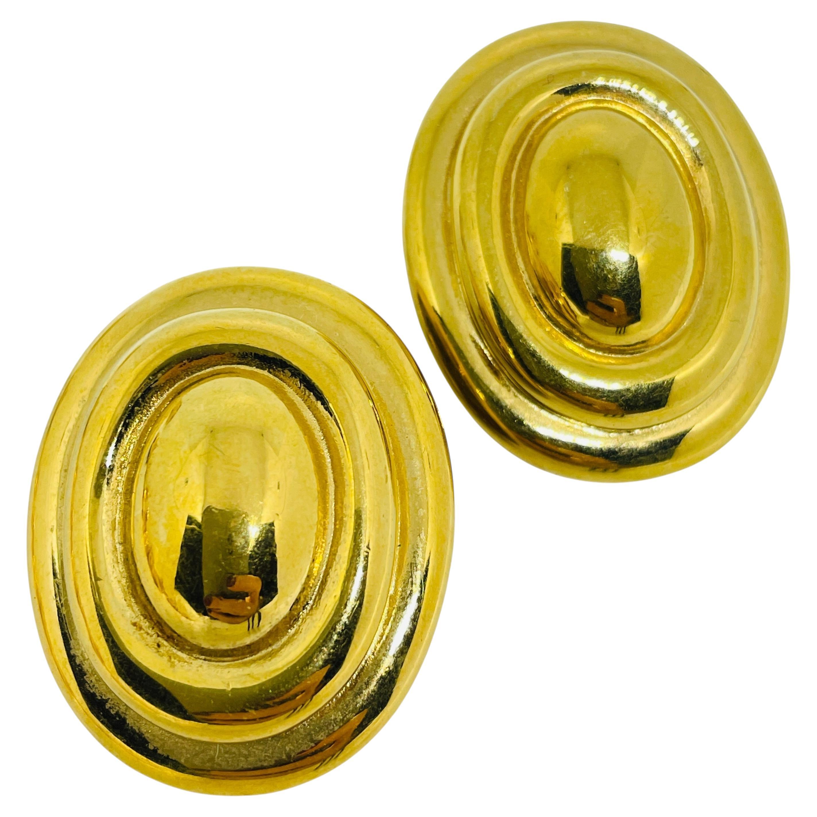 Vintage gold tone designer clip on earrings