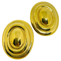 Vintage gold tone designer clip on earrings