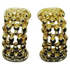 Vintage Goldtöne Designer-Ohrclips an Ohrringen