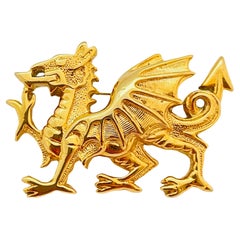 Vintage gold tone dragon designer brooch