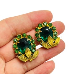 Vintage gold tone emerald green glass designer clip on earrings