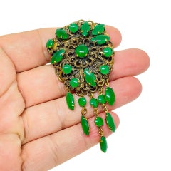 Vintage gold tone emerald green glass stones Czech dangle brooch
