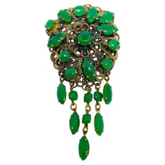 Vintage gold tone emerald green glass stones Czech dangle brooch